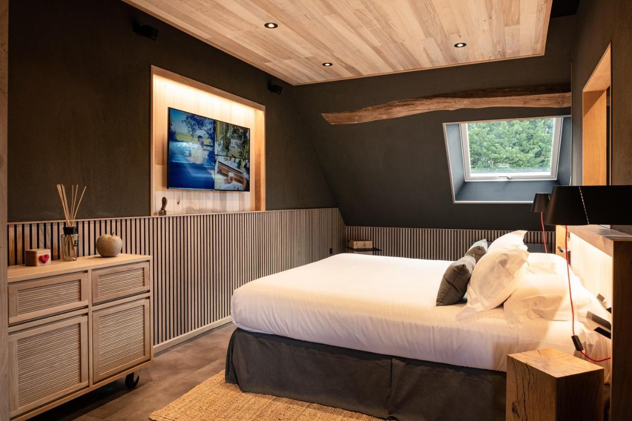 Le Studio Des Pres Verts Suite Design Avec Jacuzzi Privatif Jouey Exterior foto